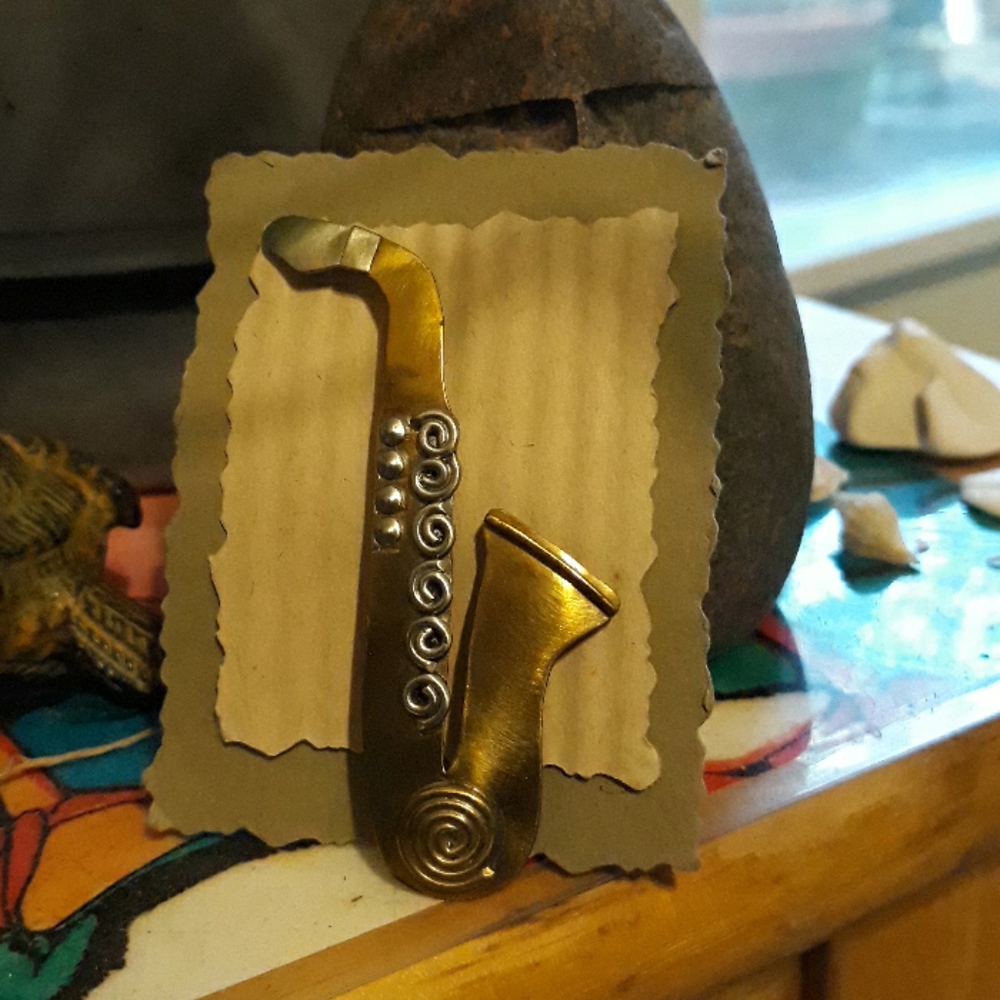 Brooch, brass saxophone great shape